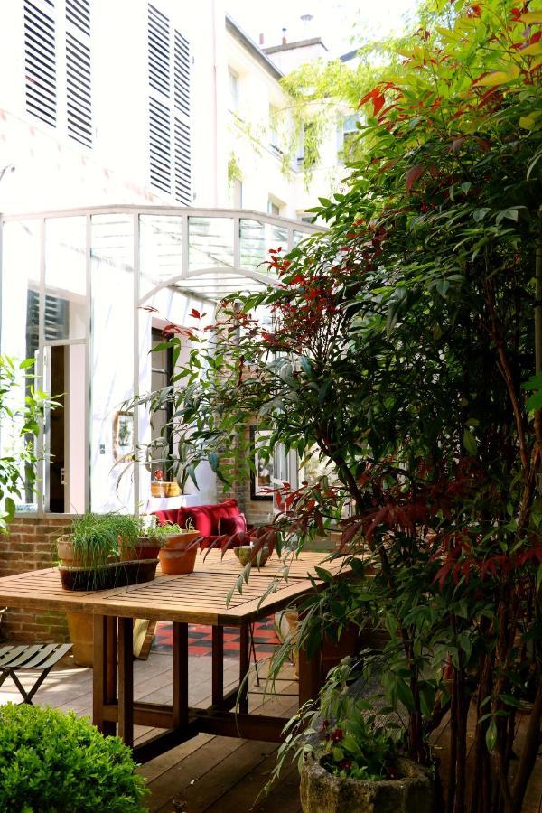 Le 66 Acomodação com café da manhã Paris Exterior foto